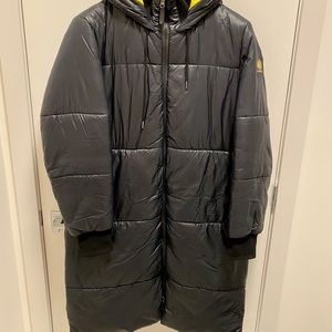 Manteau Kanuk femmes Oslo noir-jaune. Large. silouhette ample.Zone K3: -25 °C